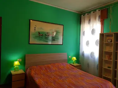 Letto o letti in una camera di B&B William