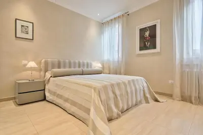 Letto o letti in una camera di Family in Rialto - centro città full optional