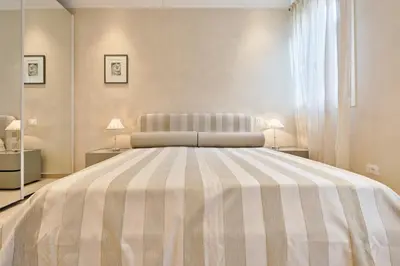 Letto o letti in una camera di Family in Rialto - centro città full optional