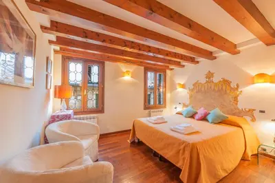 Letto o letti in una camera di Ca' delle Pizzocchere, a perfect spot in San Marco