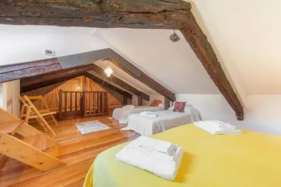 Letto o letti in una camera di Ca' delle Pizzocchere, a perfect spot in San Marco
