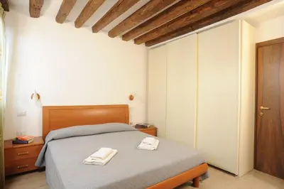 Letto o letti in una camera di APPARTAMENTO PARADISO CA' GIULIA