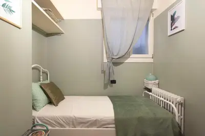 Letto o letti in una camera di Dante7 by Welc(H)ome