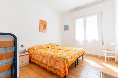 Letto o letti in una camera di Villa Norma