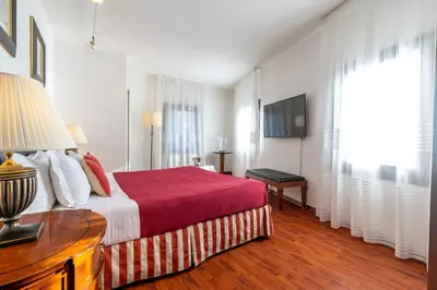 Letto o letti in una camera di Fenix Turandot Suite