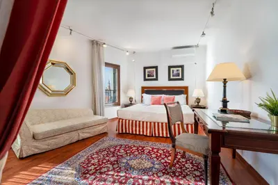 Letto o letti in una camera di Fenix Turandot Suite