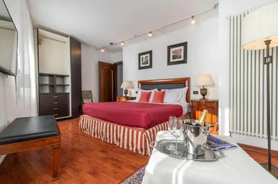 Letto o letti in una camera di Fenix Turandot Suite