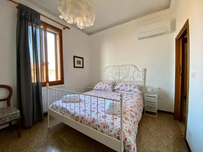 Letto o letti in una camera di Calle San Giacomo Apartment