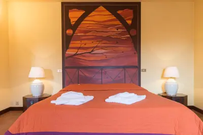 Letto o letti in una camera di Agriturismo Podere Villa Alessi