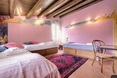 Letto o letti in una camera di Agriturismo Podere Villa Alessi
