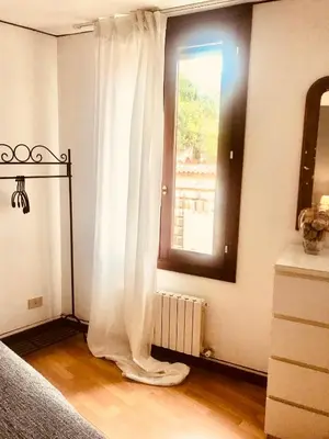 Letto o letti in una camera di Venice and Venice Apartments - private rooms in shared apartment
