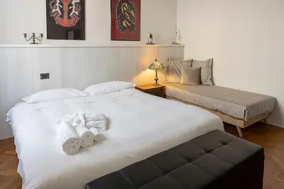 Letto o letti in una camera di Seven Suites Pieve