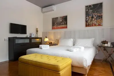 Letto o letti in una camera di Seven Suites Pieve