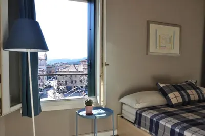 Letto o letti in una camera di Piazza Alta Penthouse