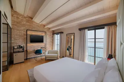 Letto o letti in una camera di NH Collection Murano Villa