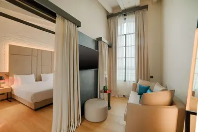 Letto o letti in una camera di NH Collection Murano Villa