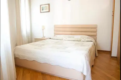 Letto o letti in una camera di Anzolo Palace - Rooms & Apartments
