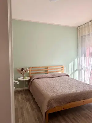 Letto o letti in una camera di Casa TOÈ