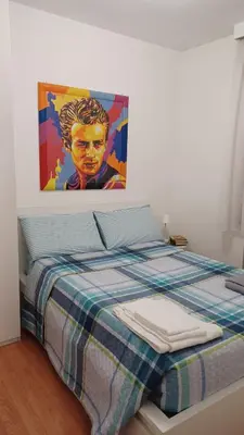 Letto o letti in una camera di Al teatro