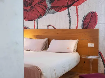 Letto o letti in una camera di LEONI DI COLLALTO PALACE