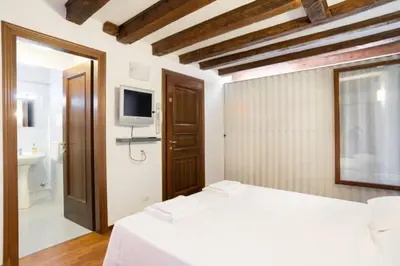 Letto o letti in una camera di Studio in San Marco square