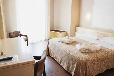 Letto o letti in una camera di Hotel Terme Marconi