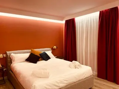 Letto o letti in una camera di Dimora del Teatro