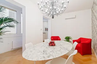 Area soggiorno di GuestHost - San Fermo Luxury Apartment