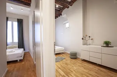 Letto o letti in una camera di San Polo Design Apartments by Wonderful Italy