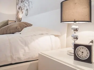 Letto o letti in una camera di San Polo Design Apartments by Wonderful Italy