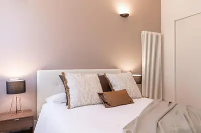 Letto o letti in una camera di Casanova Deluxe Apartment by Wonderful Italy