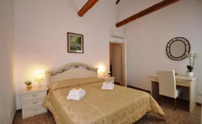Letto o letti in una camera di Ca' Alansari
