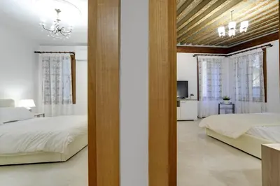 Letto o letti in una camera di Ca' Rialto