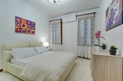 Letto o letti in una camera di Ca' Rialto