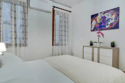 Letto o letti in una camera di Ca' Rialto