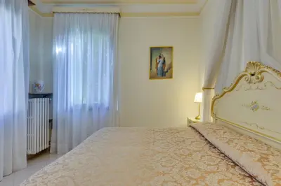 Letto o letti in una camera di Hotel Bernardi Semenzato
