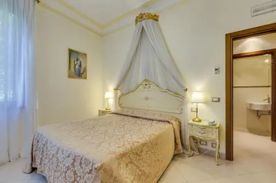 Letto o letti in una camera di Hotel Bernardi Semenzato