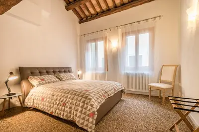 Letto o letti in una camera di VENETIAN NEW STYLE @ CA' D'ORO