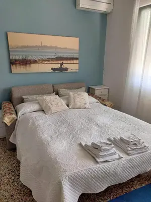 Letto o letti in una camera di Holiday With Children In Venice