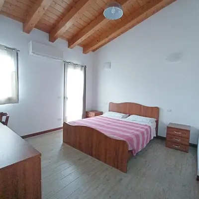 Letto o letti in una camera di Agriturismo Trabucco