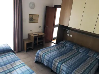 Letto o letti in una camera di Hotel Ondina