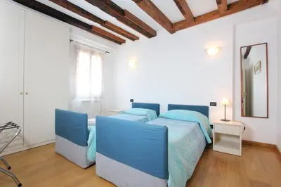Letto o letti in una camera di Residence dei Mori