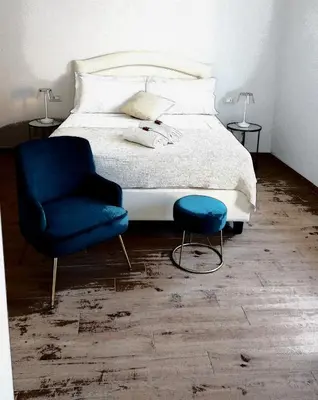 Letto o letti in una camera di Ca' Benedetta Suite House Apartsuite Chioggia