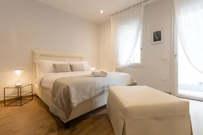 Letto o letti in una camera di Ca' Benedetta Suite House Apartsuite Chioggia