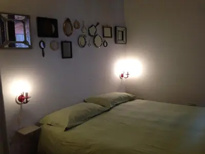 Letto o letti in una camera di Casarossa