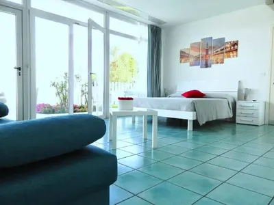 Letto o letti in una camera di Villa Marina