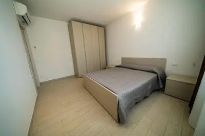 Letto o letti in una camera di Sabbia & Mare