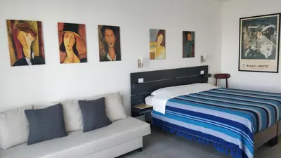 Letto o letti in una camera di Porte di Venezia, Tessera Aeroporto
