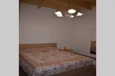 Letto o letti in una camera di La Casetta