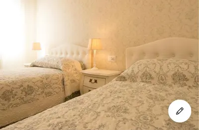 Letto o letti in una camera di Grimaldi Apartments Ca Del Moro